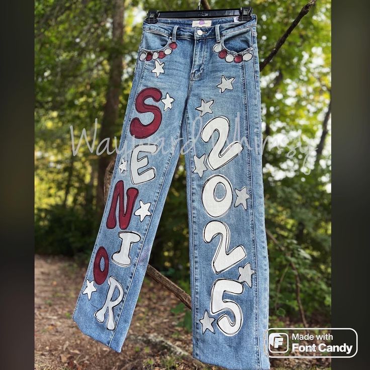 A hand painted customized pair of Jeans is the perfect accessory to top of your special outfit!  For birthdays, vacations, bachelorette parties, weddings, graduation or any ole day of the week!  You will purchase this listing for the painting.  After purchase you will message me to get my address where you will mail me the jeans.  You can discuss your specific requests with me and send me screenshots of inspiration photos!   *please know that I will NOT replicate any other artists work, but am happy to use as inspiration* The fabric medium I use indicates that is it safe for machine washing.  However, If you chose to do so, please know that I can not be responsible for any damage, fading or peeling. I recommended Spot cleaning as needed.    I am so excited to create the perfect piece for y Homecoming Painted Jeans Ideas Diy, Painted Jeans School Spirit Football, Pink And White Senior Jeans, Jean Painting Ideas School Spirit, Diy Senior Pants, Senior Hoco Jeans Ideas, Senior Pants High Schools 2025, Senior Jeans Red White And Blue, Homecoming Jeans Ideas Freshman