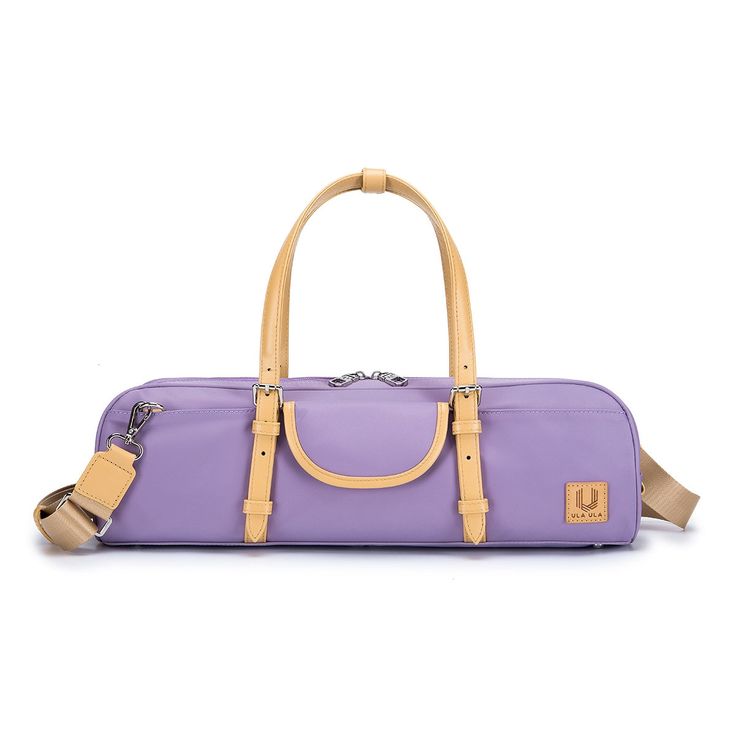 a purple duffel bag with tan handles and straps on the handle, sitting against a white background