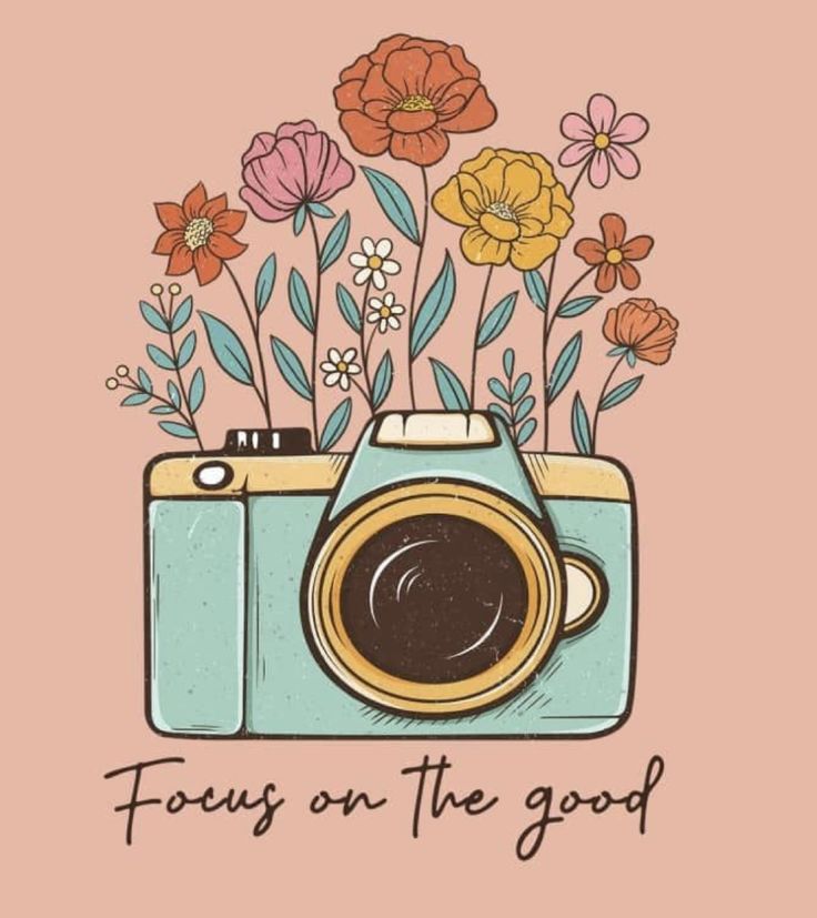 a camera with flowers on it and the words, focus on the good written below