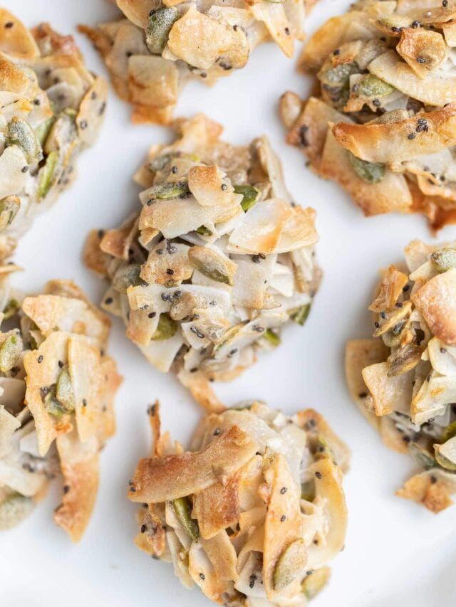 some food is on a white plate and has been cut into small pieces to make it look like they are coming out of the oven