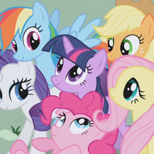 many little ponys are standing together in a group