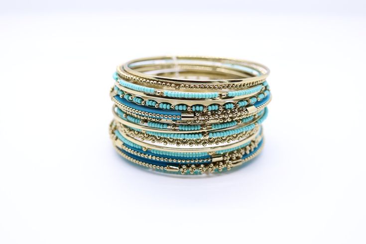 Turquoise Stackable Bracelets For Festivals, Stackable Turquoise Jewelry For Festivals, Bohemian Beaded Bangle, Bohemian Gold Bracelets With Beads, Bohemian Gold Bracelets With Gold Beads, Bohemian Blue Beaded Bangle, Bohemian Turquoise Bangle For Festivals, Bohemian Gold Beaded Bangle, Gold Beaded Bohemian Bangle