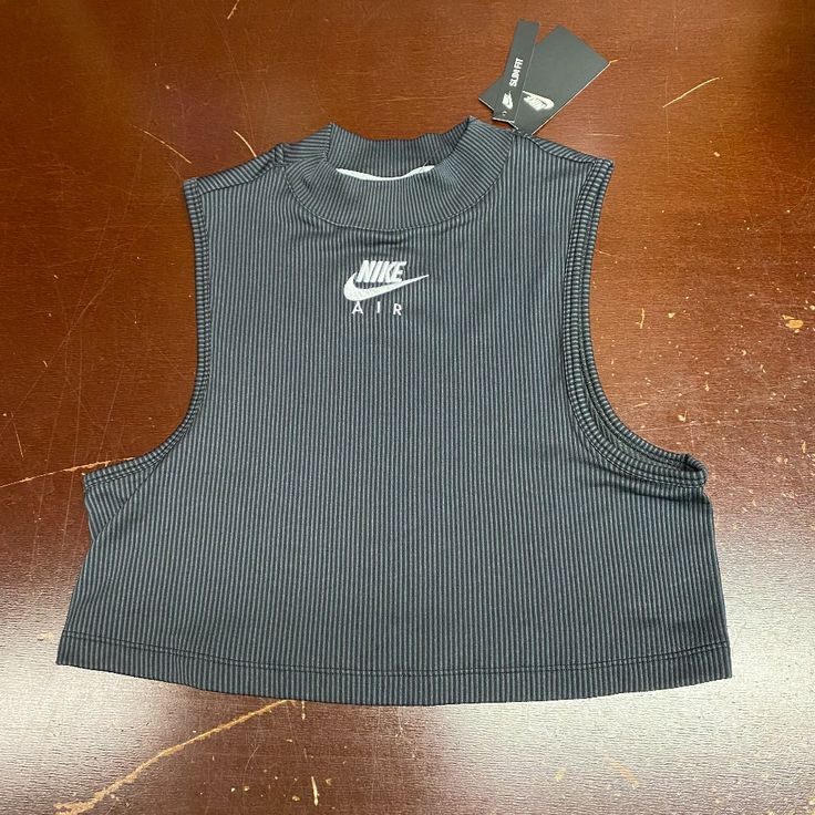 Nike Womens Black Sportswear Air Rib Mock Neck Sleeveless Cropped Tank Top Sz Xl Brand: Nike Department: Women Size: Xl Color: Black Type: Tank Style: Cropped Pattern: Striped Theme: Sports Neckline: Mock Neck Occasion: Activewear Season: All Season Features: Comfort, Easy Care Condition: New With Tags I Offer Discounts For All Return Customers. - Jvs Sporty Crew Neck Vest For Spring, Spring Sporty Crew Neck Vest, Sporty Sleeveless Spring Vest, Black Sleeveless Workout Top, Casual Sleeveless Tops With Moisture-wicking, Black Sleeveless Crop Top For Streetwear, Casual Sleeveless Streetwear Crop Top, Black Sleeveless Athleisure Vest, Fitted Tops For Leisure In Spring