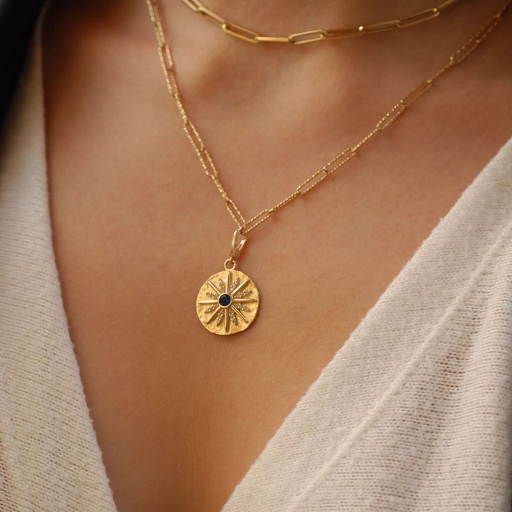 "Discover the essence of elegance with our 14K solid gold sunshine coin necklace charm, a versatile and exquisite disc charm featuring a radiant sunshine motif.  It's equipped with a user-friendly push clasp, making it effortlessly attachable to necklaces, bracelets, or earrings. Ideal for personalizing your jewelry ensemble or gifting to someone special, this charm stands out as a symbol of hope and positivity.  PRODUCT DETAILS: * Material: 14K Solid Gold (real solid gold, no gold-filled or no gold plated material) * Style: Minimalist * Versatile charm with push in clasp for easy attachment to necklaces, bracelets, and earrings. HOW TO WEAR? *As a Necklace Charm: Add it to your favorite chain for a subtle yet powerful statement. *As a Bracelet Charm: Attach it to your bracelet for a touch Sunshine Design, Sunburst Necklace, Sunshine Necklace, Gold Coin Necklace, Gold Sun, Gold Coin, Coin Necklace, Style Minimalist, Gold Coins