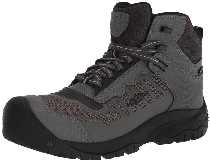 a pair of gray hiking boots on a white background