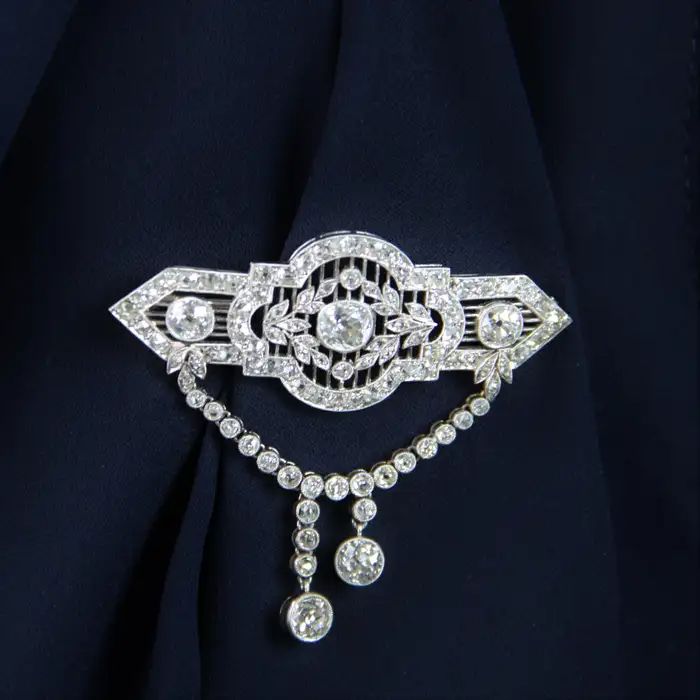 1920s Diamonds Platinum Lace Brooch For Sale at 1stDibs White Diamond Wedding Brooches, Classic Platinum Brooches With Diamond Accents, Classic White Diamond Brooches, Luxury Diamond White Brooches For Wedding, Classic White Gold Diamond Brooch, Classic White Gold Brooches With Single Cut Diamonds, Classic White Gold Diamond Brooches, Classic Diamond Brooch In White Gold, Elegant Diamond White Brooches For Wedding