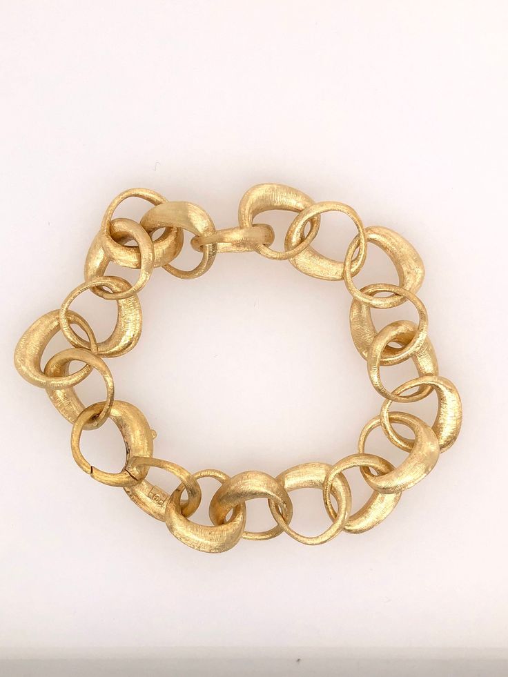 This is a 18k yellow gold link bracelet made in Italy. The etched finish on this bracelet is done by hand which makes a dull and shiny at the same time. The bracelet is 8 1/2 inches however because of link size the real length is around 7 1/2 to 7 3/4.  Each link is approximately 15.43 x 14.78 mm 18k Gold Bracelet, Gold Link Bracelet, Mens Gold Bracelets, Chunky Bracelets, Gold Link, Gold Bracelet Chain, Diamond Heart, Bracelet Stack, Chain Link Bracelet