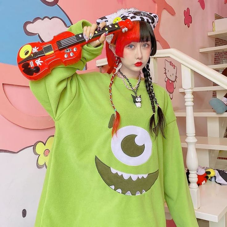 Material: Polyester. Cotton Size Measurements: One size Bust: 136cm Shoulder: 64cm Sleeve: 63cm Length: 74cm Oversized Long Sleeve T-shirt With Cartoon Print, Casual Long Sleeve Cartoon Print T-shirt, Oversized Long Sleeve Harajuku Tops, Oversized Harajuku Long Sleeve T-shirt, Playful Green Crew Neck Top, Oversized Graphic Print Kawaii Tops, Oversized Kawaii Tops For Streetwear, Oversized Kawaii Tops With Graphic Print, Playful Fall Streetwear Tops