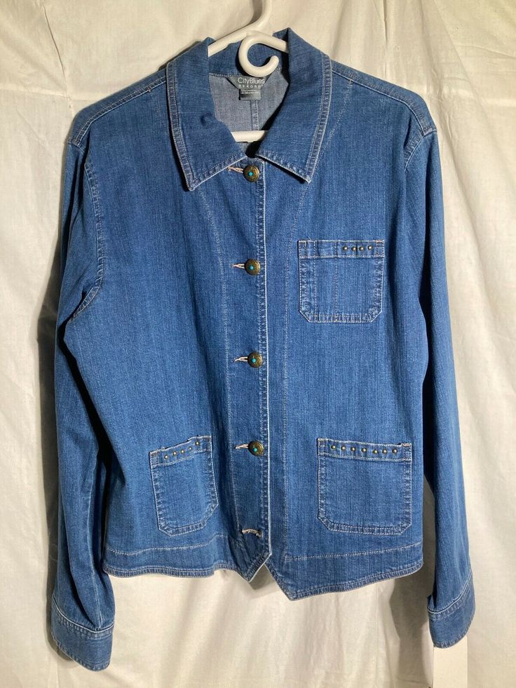 Vintage Koret City Blues Denim Jacket  Women's - Large,   Color:  Blue. Shell:  98% Cotton / 2% Spandex.  Sleeve: 25in., Waist: 21in., P to P: 22in., Back: 22in. Shoulder: 18in. Machine Wash Cold.  Condition is New old Sock with tags. Shipped with USPS Mail/Fedex. Blue Jeans With Buttoned Pockets For Fall, Blue Washed Utility Jacket For Work, Collared Light Wash Outerwear With Button Closure, Blue Denim Utility Jacket For Work, Utility Denim Jacket With Buttons For Everyday Use, Everyday Utility Denim Jacket With Buttons, Classic Washed Blue Denim Jacket With Buttons, Blue Denim Utility Jacket With Buttoned Pockets, Casual Medium Wash Utility Jacket With Button Closure