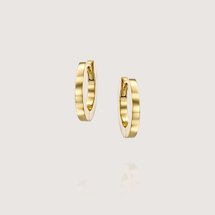 Our simple yet elegant iconic hoop earrings. Timeless and Classic, fits any outfit and any occasion. Made of 14K gold, open and close with a strong safe mechanism , simple and comfortable. Perfect for the everyday casual chic look, they can also be worn to top off an exquisite evening look. The earrings are sold as singles All of our jewelry is carefully handmade in our atelier To order by phone 972-72-2991000 Minimalist Polished Finish Hoop Earrings For Everyday Luxury, Modern Yellow Gold Huggie Earrings For Everyday, Modern 14k Gold Small Hoop Huggie Earrings, Luxury Everyday Huggie Hoop Earrings, Chic 14k Gold Hoop Earrings, Chic Yellow Gold Huggie Earrings, Chic 14k Gold Hoop Earrings For Formal Occasions, Luxury Everyday White Gold Huggie Earrings, Luxury Huggie Hoop Earrings For Everyday