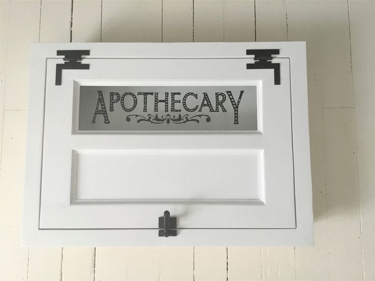 a sign that says apothecary hanging on the wall