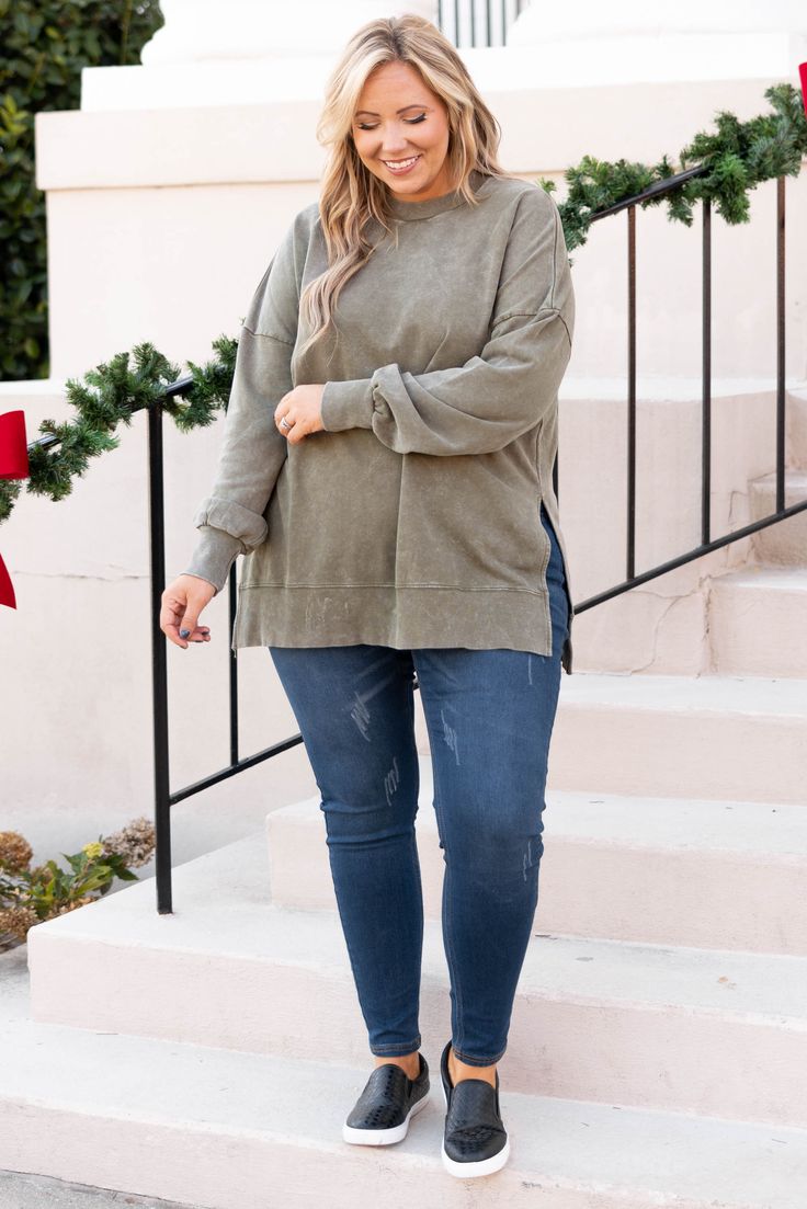 Our ALL NEW pullover is here!!! This cozy cutie has a flattering banded hem, and long loose fit! This will be your new go-to piece for the Fall and Winter or any time of year, really! It is seriously the softest material ever, and the olive color makes it SO easy to style! Pair it with leggings, skinnies, booties, flats, a scarf, some glam accessories...seriously the opportunities are endless!! This comfy, cute beauty is a no-brainer!! *﻿This style is acid-washed. There may be color discrepancies. 100% Cotton Cozy Fleece Sweater With Relaxed Fit, Midweight Fleece Sweatshirt For Fall, Plus Size Over Sized Sweater, Cozy Fleece-lined Sweater For Fall, Fall Plus Size Outfits, Plus Size Slouchy Sweater, Cozy Pullover, Olive Color, Model Fits