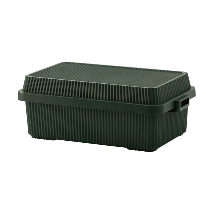 an empty green plastic container on a white background