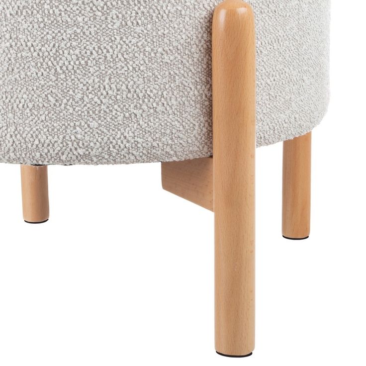 an upholstered foot stool with wooden legs and fabric seat padding, viewed from the front