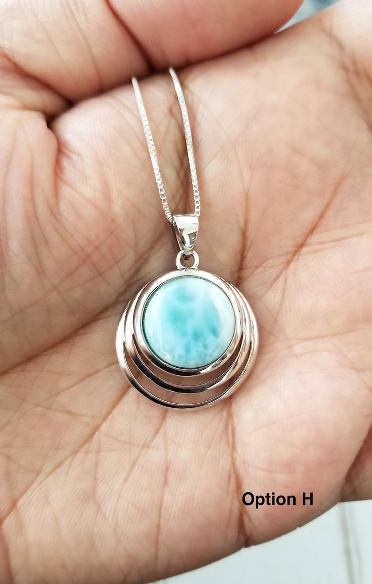 Our new addition to our amazing line! Beautiful Round Sky Blue Larimar Necklace with - 925 Sterling Silver. Larimar is a beautiful blue stone found only in the Dominican Republic, in the Carribean. Larimar is also known as the Stefilia's Stone, Pectolite and the Calming Stone. Larimar is commonly light blue with marbling inside.. As this is a natural stone , each stone is unique in its color, shade and character. The Pendant measures 22mm height x 22mm width not counting the bail. Sterling silve Tarnished Silver Jewelry, The Carribean, Larimar Necklace, Larimar Pendant, Tarnished Silver, Calming Stones, The Dominican Republic, Marbling, Toe Rings