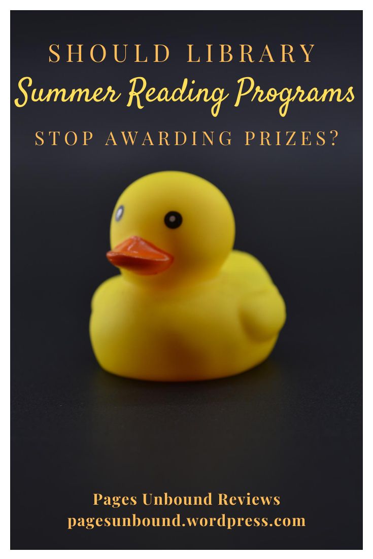 a yellow rubber ducky sitting on top of a black surface with the words, should you