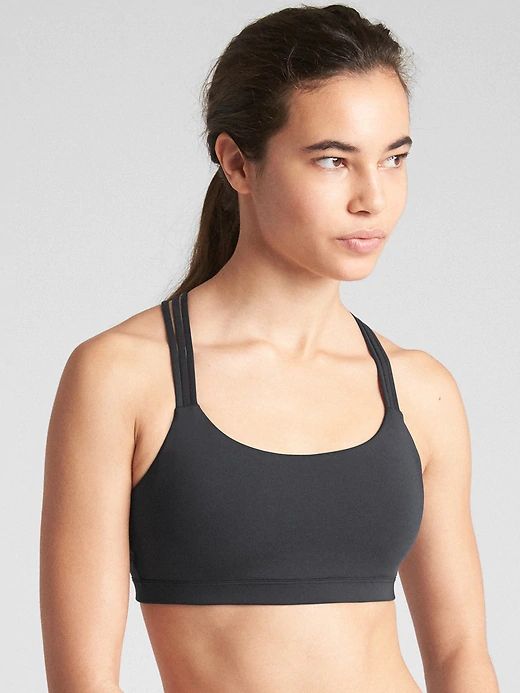 GapFit Eclipse Medium Support Strappy Sports Bra | Gap Gap Activewear With 4-way Stretch For Sports, Gap 4-way Stretch Activewear For Sports, Gap Activewear 4-way Stretch For Sports, Gap Moisture-wicking 4-way Stretch Activewear, Fitted Gap Activewear With Go-dry Technology, Fitted Gap Activewear For Sports, Functional Gap Activewear For Sports, Sporty Stretch Activewear By Gap, Gap Fitted Moisture-wicking Activewear