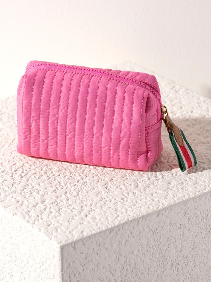 Perfect your on-the-go lifestyle with Ezra Small Boxy Cosmetic Pouch. This pouch features a sleek quilted body, and a boxy silhouette, perfectly pairing with Ezra Totes. Measuring L 7" × W 3" × H 4", and made from nylon, the Ezra Small Pouch is equipped with an inner zip and slip pocket, maximizing the space this pouch provides. This pouch is perfect for storing your makeup, toiletries or any odds and ends that you may need during travel or on a daily basis. Pair with other items from to complet Gwp Ideas, Tas Canvas, Cos Bag, Pencil Pouches, English Practice, Barefoot Dreams Blanket, Golf Socks Women, Beauty Wishlist, Accessory Inspo