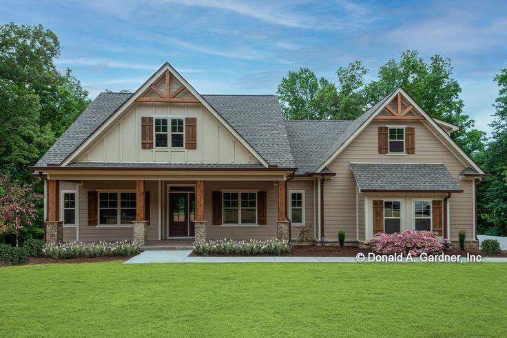 a house that is sitting in the grass