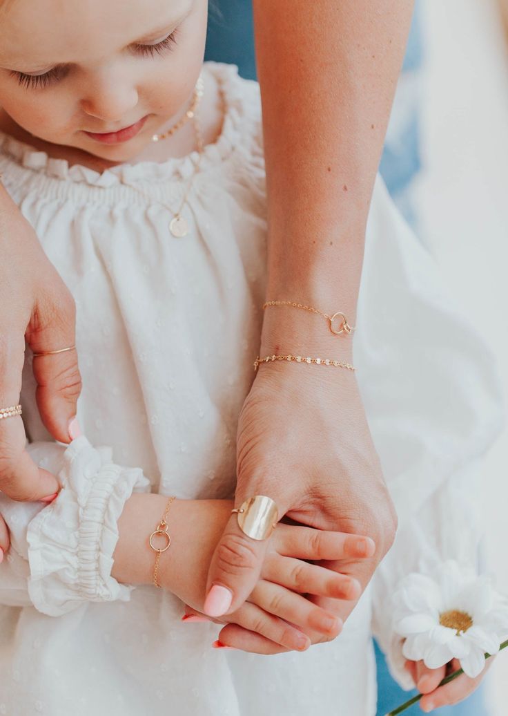 The TINY collection is home to our most dainty + delicate pieces. Tiny links measure 1/2" wide and are attached to our most delicate chain. Bracelet is adjustable from 6.5 - 7". Available in 14kt Gold Fill + Sterling Silver. Handmade in Eau Claire, WI Our jewelry is handmade so each piece will be unique and may vary slightly from what is pictured. Adjustable Everyday Gold Bracelet For Mother's Day, Adjustable Hypoallergenic Bracelet In 14k Gold, Adjustable Hypoallergenic Bracelets In 14k Gold, Hypoallergenic Adjustable Bracelets In 14k Gold, Adjustable Hypoallergenic 14k Gold Bracelet, Dainty Gold Charm Bracelet With Adjustable Chain, Delicate Chain Bracelet With Extender, Adjustable Hypoallergenic Rose Gold Chain Bracelet, Delicate Adjustable Everyday Charm Bracelet