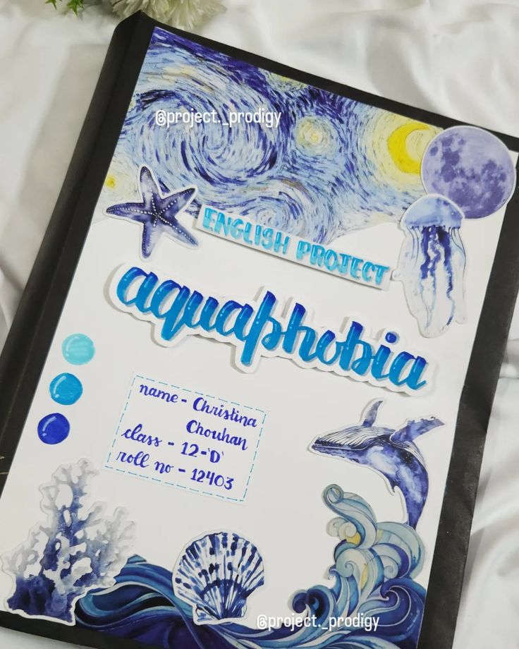 an open book with the words aquaphobia written in blue and white ink