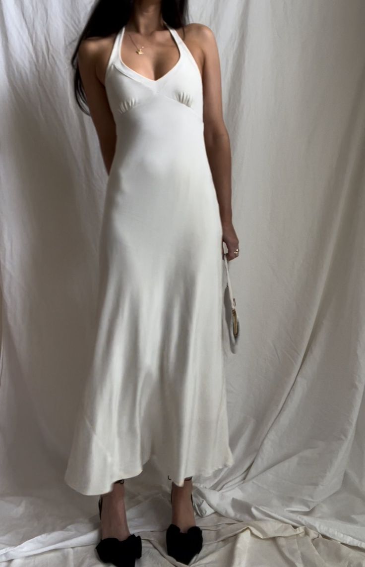 Eloping in Hawaii? Cop this 100% silk ivory halter dress. Fully lined so it’s not see-through. size: Small brand: JCrew Chic Silk Slip Dress For Garden Party, White Halter Dress For Garden Party, Elegant Summer Slip Dress For Garden Party, Fitted Silk Halter Dress With Bias Cut, White Sleeveless Silk Party Dress, Chic Slip Dress With Fitted Bodice For Garden Party, Fitted Bias Cut Halter Dress For Summer, Off White Satin Summer Dress, Chic Cream Sleeveless Slip Dress