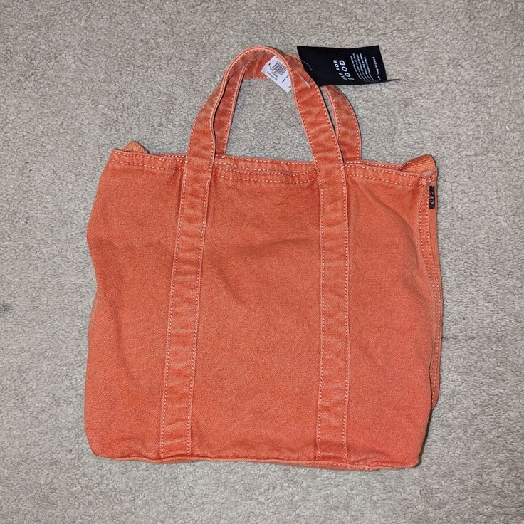 Gap Tote Bag Never Used Casual Orange Bags With Pockets, Casual Bags With Top Carry Handle For Errands, Casual Bags For Errands With Top Carry Handle, Casual Orange Bucket Bag, Casual Tote Bag For Errands, Casual Orange Shoulder Bucket Bag, Casual Gap Bags For Everyday Use, Casual Orange Rectangular Canvas Bag, Casual Orange Shoulder Bag For Shopping