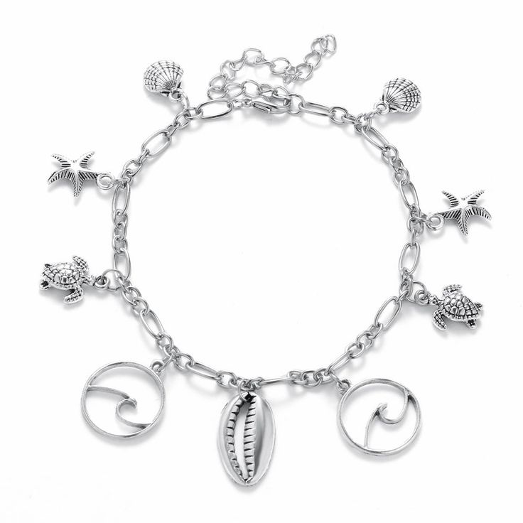 Entice Your Style with Elegance and Charm Step into summer with flair and a touch of ocean-inspired beauty with our Bohemian Starfish Pendant Anklet. Designed to accentuate your ankles with an eye-catching sparkle, this trendy anklet is perfect for beach days, casual outings, and special summer nights out. Crafted with meticulous attention to detail, this piece is not just jewelry; it's a statement of style and personality. Product Features This exquisite anklet is crafted from high-quality zinc alloy, ensuring durability while remaining lightweight on your ankle. The charming starfish pendant dangles gracefully, catching the light and adding a playful touch to your movement. With a length of 23.5cm and an additional 7cm extension chain, it offers a customizable fit for all sizes, securing Beach Silver Jewelry, Leg Jewelry, Starfish Anklets, Anklets For Women, Summer Anklets, Wave Bracelet, Starfish Pendant, Ocean Jewelry, Turtle Pendant