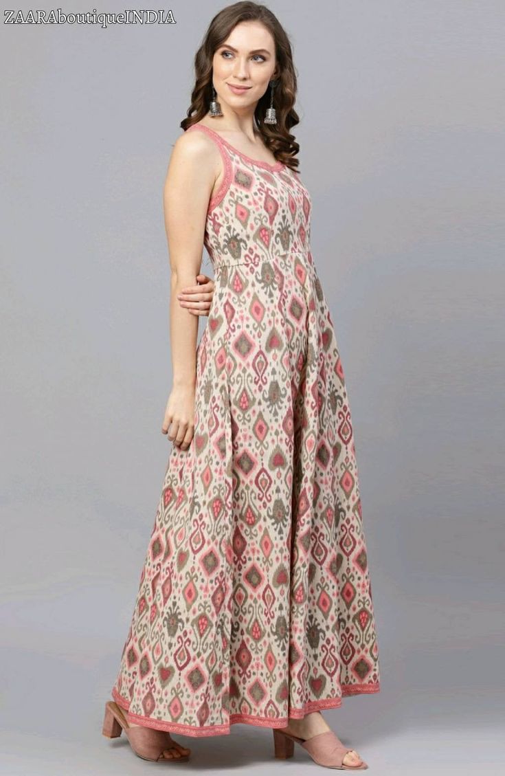 "HAND WOVEN MAXI DRESS *Sensationalize your wardrobe with this cream and pink sleeveless dress. *Tailored to sartorial perfection from premium quality fabric, it assures a soft and soothing touch against the skin.The round neck adds to its appeal. The printed pattern makes it a captivating choice. *Fabric:- Cotton *Wash Care:- Machine-wash *Color:- Cream & Pink *Neck/Collar:- Round neck *Model fit:- Model is 5'7\"/170 cms and is wearing S *Sleeve:- Sleeveless AVAILABLE IN 5 SIZES THEY ARE IN Bollywood Style Cotton Floor-length Dress, Cotton Sleeveless Dress For Navratri, Fitted Bandhani Print Dress, Traditional Sleeveless Maxi Dress For Festivals, Pink Dress With Printed Motifs For Navratri, Festive Cotton Maxi Dress With Printed Motifs, Fitted Bollywood Bandhani Print Dress, Bohemian Sleeveless Dresses For Navratri, Bohemian Fitted Floor-length Kurta