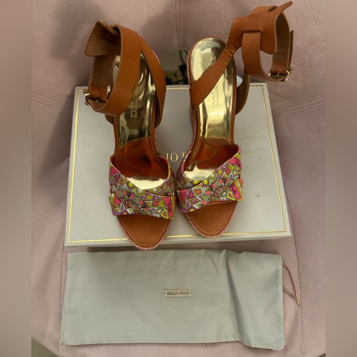 New Emilio Pucci Fuchsia Canvas Wedge Sandals With Camel Leather Color: Fuchsia (Pink) Gold Metal Accents Size: 38 (Runs Half A Size Smaller, So Fits A Us 7.5) Made In Spain Brand New, Never Worn Comes With Box And Dust Bag Please Notice The Photos Showing Part Of The Golden Color Inside The Shoe Has Faded. Luxury Pink Wedge Heel Sandals, Luxury Multicolor Heels For Summer, Luxury Multicolor Summer Heels, Luxury Multicolor Sandals For Spring, Luxury Summer Wedge Sandals With Wrapped Heel, Luxury Wedge Sandals With Wrapped Heel And Ankle Strap, Brown Open Heel Wedge Sandals For Party, Brown High Heel Wedge Sandals For Party, Luxury Multicolor Open Heel Sandals