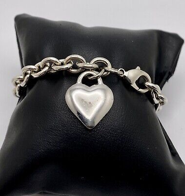 Silver tone Heart charm bracelet  | eBay Trendy Pendant Charms Jewelry, Trendy Pendant Jewelry With Charms, Trendy Sterling Silver Charms Jewelry, Trendy Sterling Silver Jewelry With Charms, Classic Everyday Heart Charm Bracelet, Trendy Jewelry Gift For Her On Valentine's Day, Heart-shaped Jewelry With Dangling Charms For Valentine's Day, Heart-shaped Dangling Charms Jewelry For Valentine's Day, Elegant Sterling Silver Charms Bracelet For Everyday