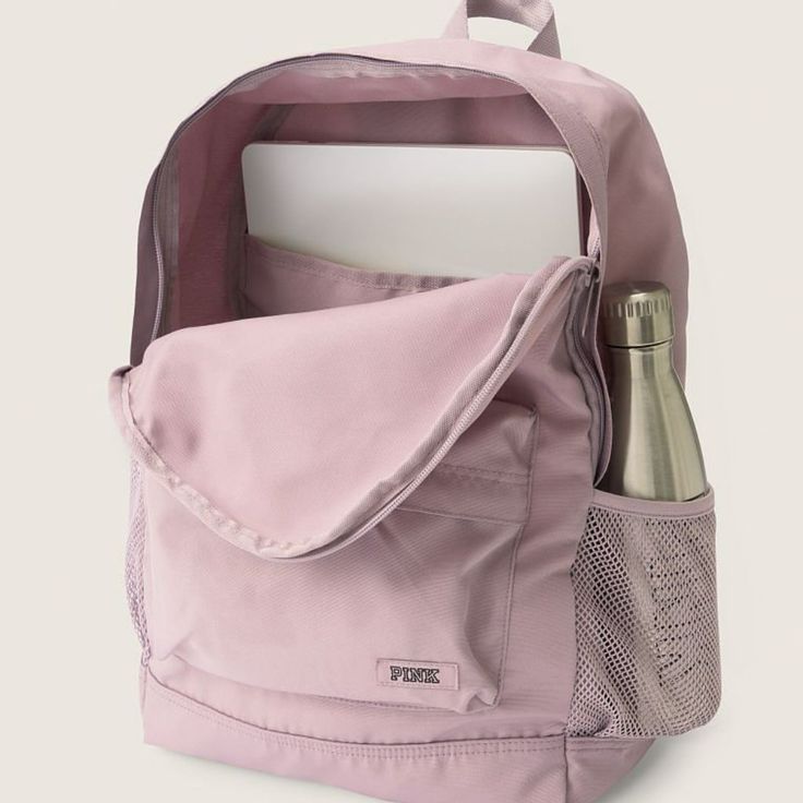 Brand: Victoria's Secret Pink Style: Classic Backpack Color: Dreamy Lilac Condition: Brand New With Tags. See Pictures For Details. -Lightweight Fabric -Water Bottle Pockets -Interior Laptop Sleeve -Comfy Padded Shoulder Straps -Fits 15" Laptop In Packaging! Everyday Pink Bag With Water Bottle Pocket, Pink Backpack With Water Bottle Pocket, Pink Backpack With Water Bottle Pocket For Daily Use, Pink Bookbag, Vs Pink Backpack, Pink Backpacks, Pink Backpack Victoria Secret, Victoria Secret Backpack, Vs Pink Nation