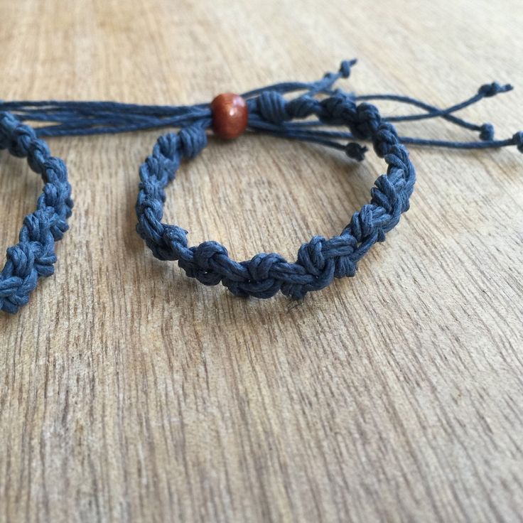 "These lovely bracelets were made using blue hemp cord. They are adjustable and designed for everyday wear. The big bracelet closes to around 6.5\" and opens to around 9\". The little bracelet will fit a 5\" wrist and opens to 7\". Please feel free to contact me if you have any questions For more Daddy and me/ Mom and Son Bracelets: https://www.etsy.com/shop/Fanfarria?section_id=17007792&ref=shopsection_leftnav_4 Check for Hemp Jewelry: https://www.etsy.com/shop/fanfarria?section_id=16963242 Blue Jewelry With Adjustable Band, Blue Adjustable Cord Bracelet As A Gift, Blue Adjustable Cord Bracelet Gift, Adjustable Blue Friendship Bracelets With Sliding Knot, Adjustable Blue Friendship Bracelet, Blue Adjustable Cord Friendship Bracelet Gift, Adjustable Blue Braided Bracelets Gift, Adjustable Blue Macrame Jewelry, Blue Braided Bracelet With Sliding Knot As Gift