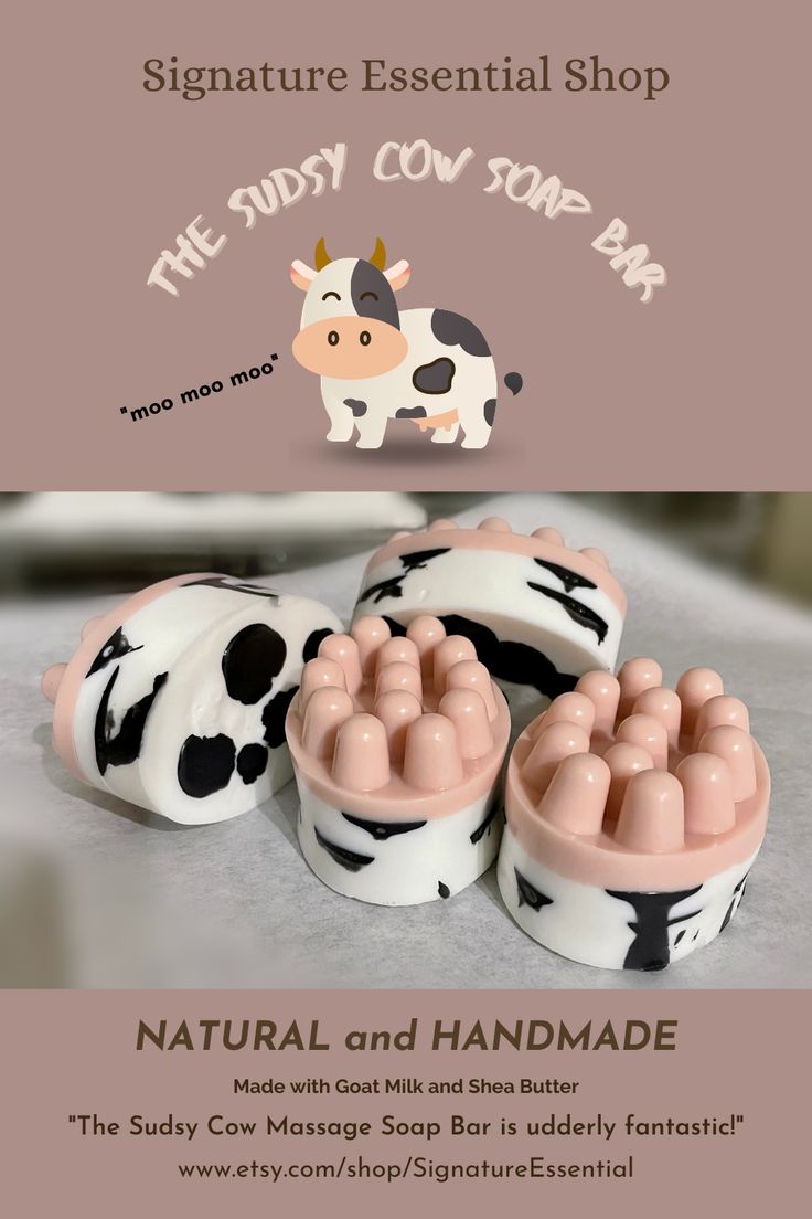 three cow shaped soaps sitting on top of each other with the words, natural and handmade