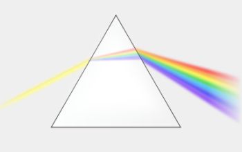 a white triangle with rainbow rays coming out of it