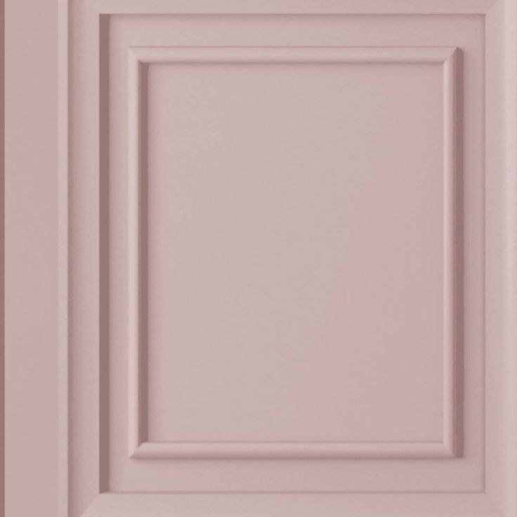 a close up view of a pink cabinet door