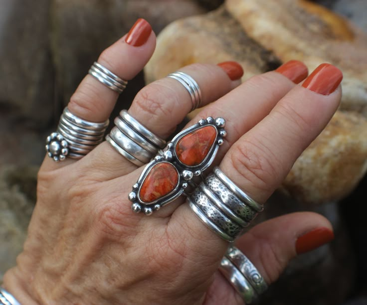 "APPLE CORAL RING --- handcrafted in oxidized STERLING SILVER --- Multi-Stone Rings for Her BIG RINGS FOR WOMEN --- Orange Colored Jewelry SIGNED AND DATED ARTISAN MADE US WOMEN'S SIZE 7  BAND STYLE: OPEN STYLE three (3) ridge handmade sterling silver band (BS1). Band is approximately .25\" wide.  This width is important when considering size as I do not offer re-sizing. FACE OF THIS WESTERN STYLE TWO STONE RING IS APPROXIMATELY:  1.7\" Long .6\" Wide NOTE: The only item included in this sale is the Cowgirl Style / Hippie Chic TWO STONE Apple Coral Ring.  The single stone jasper ring IS NOT included in this sale.  Cabochons may or may not include backing. Gemstones may include natural inclusions. Jewellery is handmade in a freeform style with basic silversmithing tools and has been oxidize Turquoise Stone Rings, Cabochon Rings, Western Style Rings, Cowgirl Rings, Silversmith Rings, Navajo Turquoise Jewelry, Western Rings, Silversmithing Jewelry, Silversmith Jewellery