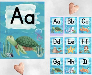 an animal alphabet game with sea animals and letters on the board, including a turtle