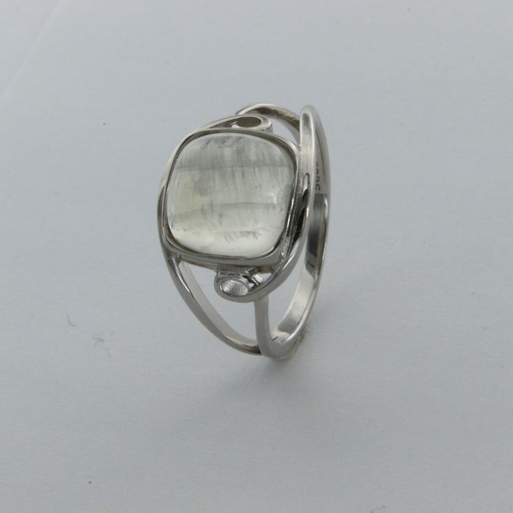 These is a beautiful pair of Sterling Silver R ing with a Rainbow Moonstone Gemstone. The ring are made out of solid 925 Silver and there is no nickel or other substances causing most allergies. This makes the ring hypo allergenic. Size of the Moonstone 1.0 x 1.0 cm or 0.39 x 0.39 inch You will receive the item in a gift box - perfect to surprise someone or yourself. Usually we ship on the same day we receive the payment for the order. We want you to be happy with your purchase. If you do not li Silver Crystal Ring With Accent Stones In Sterling Silver, Silver Sterling Crystal Ring With Accent Stones, Sterling Silver Polished Gemstones For Fine Jewelry, Polished Sterling Silver Gemstones, Silver Gemstones With Polished Finish, Sterling Silver Polished Moonstone Ring As Gift, Polished Silver Gemstones For Anniversary, Fine Jewelry Silver Hallmarked Moonstone Ring, Silver Gemstones With Polished Finish For Anniversary