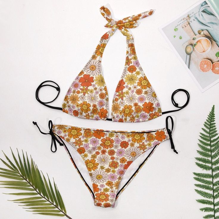 Halter Bikini Set, Two Piece bikini set, Orange Bikini, 70s style, 70s inspired swimsuit, 70s inspired bikini, Women's bikini, Floral Bikini A cute 70s inspired bikini with cute orange and pink floral pattern print. Gorgeous halter top with ties. Matching bikini bottom. A great retro 70s hippie style find. I hope you enjoy this design I created. Orange Adjustable Triangle Top Swimwear, Adjustable Orange Beachwear Swimwear, Bohemian Halter Neck Swimwear For Sunbathing, Retro Print Swimwear For Beach Season, Orange Festival Swimwear, Beachwear Swimwear With Retro Print For Poolside, Retro Print Swimwear For Beach Season Vacation, Retro Print Beachwear Swimwear For Poolside, Retro Print Swimwear For Beach