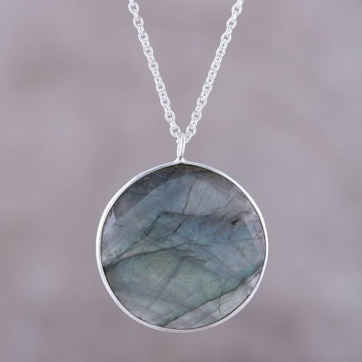 Weighing nine carats, a faceted disc of labradorite evokes the moon in this pendant necklace from India. Believed by the Inuit to possess the hues of the Aurora Borealis, the stone is framed by sterling silver. Neetu Barathi designs this necklace from India. Necklace Moon, Labradorite Necklace, Pretty Pendant, Labradorite Pendant, Jewelry Packaging, Jewelry Gift Box, Free Jewelry, Labradorite, Gemstone Jewelry