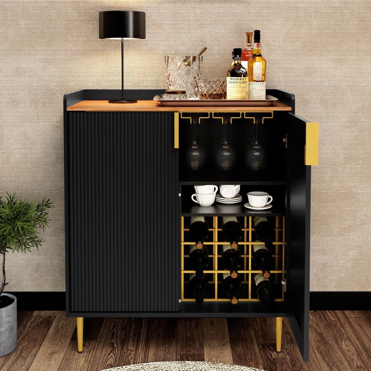 a black cabinet with wine bottles and cups on it