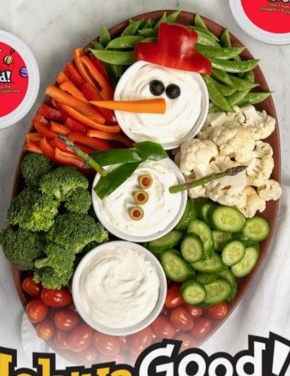 a plate filled with vegetables and dips next to the words good luck on it