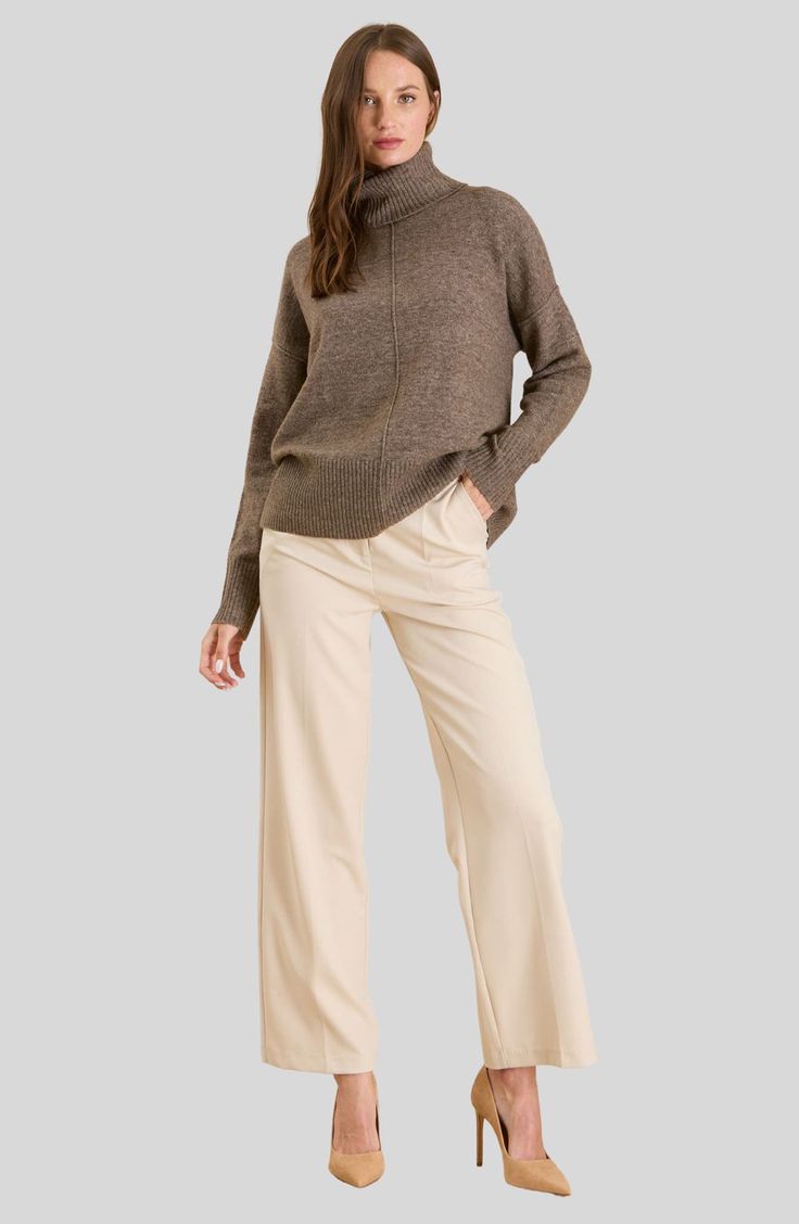 Layer on this cozy turtleneck sweater knit from soft yarns in a comfortably relaxed fit. 24 1/2" length Turtleneck Long sleeves 97% polyester, 3% spandex Hand wash, dry flat Imported Fall Turtleneck Sweater With Soft Texture, Fall Workwear Sweater With Soft Texture, Funnel Neck Soft Knit Sweater For Work, Soft Knit Funnel Neck Sweater For Work, Soft Knit Turtleneck Sweater, Casual Knit Turtleneck For Work, Turtleneck Sweater With Relaxed Fit For Work, Relaxed Fit Turtleneck Sweater For Work, Textured Knit Turtleneck Sweater For Work