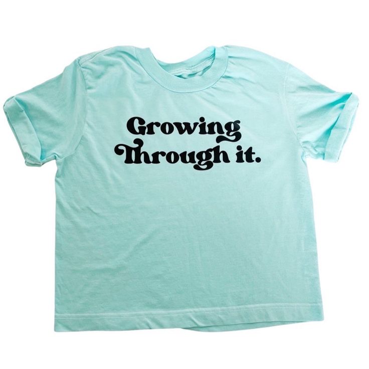 "Growing through all that life brings. Our women's style \"hip t-shirt\" is a women's relaxed fit, women should get their true size. As the name suggests, the shirt runs a bit shorter resting on the hip. If you are on the taller side, the shirt would sit right at the waistline. In the photo model is 5'2, normal size 12 wearing an XL. - see the sizing chart below." Cotton Graphic Tee With Lettering, Spring Graphic Tee With Lettering, Blue Relaxed Fit Tops With Lettering, Short Sleeve Graphic Tee With Lettering, Graphic Tee With Lettering And Short Sleeves, Family Matching Short Sleeve Tops With Letter Print, Family Matching Tops With Letter Print And Short Sleeves, Family Matching Green Tops For Spring, Spring Family Matching Graphic Print Tops