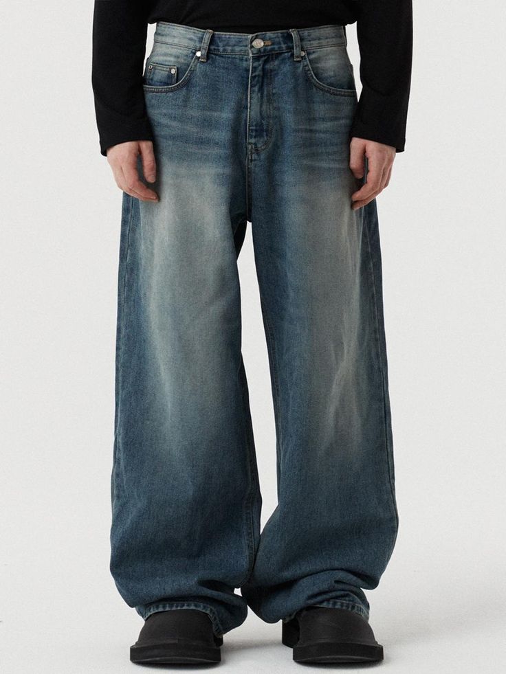 This is a trendy wide denim pants that went through a unique washing technique developed by the brand. With minimal yet unique look, you can style it in various ways for casual look. Wide silhouetteExtended lengthUnique washing Luxury Men's Wide Leg Flare Jeans, Faded Wide Leg Rigid Denim Bottoms, Faded Wide Leg Recycled Denim Bottoms, Faded Baggy Rigid Denim Bottoms, Baggy Faded Rigid Denim Bottoms, Baggy Dark Wash Wide-leg Flare Jeans, Denim Wide-leg Pants For Streetwear, Denim Wide Leg Pants For Streetwear, Relaxed Fit Recycled Denim Wide Leg Pants