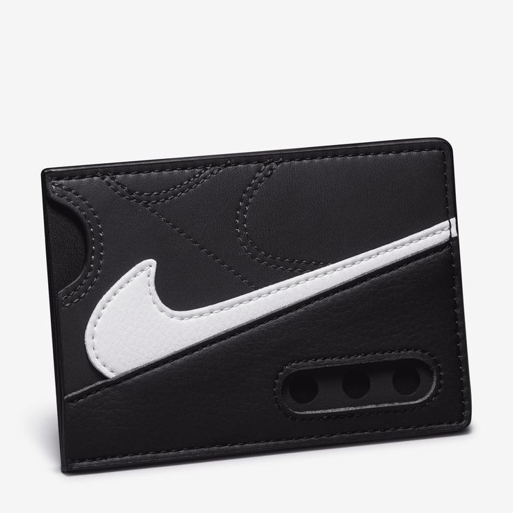 The design of this wallet was inspired by a shoe that has reigned supreme since the '90s. The wallet features a sleeve for storing cash and five slots for your cards and ID. Black Rectangular Wallet With Logo, Black Rectangular Wallets With Logo, Modern Black Wallets With Card Slots, Modern Black Wallets With Interior Card Slots, Modern Black Wallet With Interior Card Slots, Modern Black Leather Wallets, Modern Black Wallet For Daily Use, Functional Black Wallet For Daily Use, Functional Black Wallet For Everyday Use