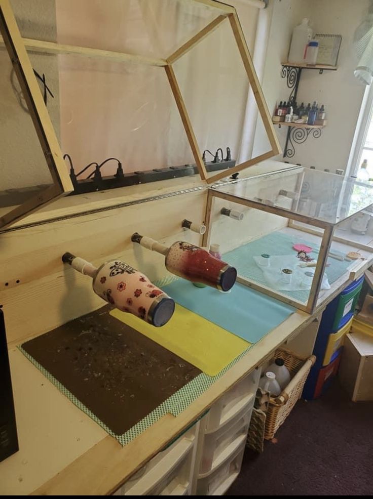 a table with various objects on it in a room