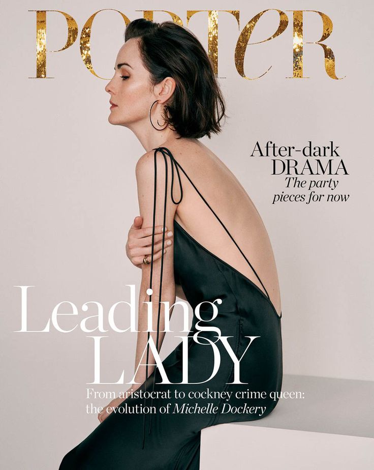 a woman in a black dress on the cover of a magazine, with her back to the camera