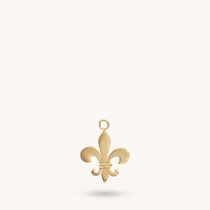 Exude regal sophistication with our Fleur de Lis Necklace, a captivating piece that pays homage to classic elegance. The Fleur de Lis, a timeless symbol of nobility and refinement, is beautifully showcased in this necklace. Whether worn as a statement piece or as a daily reminder of your own grace and strength, our Fleur de Lis Necklace is a majestic accessory that effortlessly elevates any ensemble. - Made in 14k solid gold - Pendant: 13.73x12.20 mm / 0.54x0.48 inches - Pendant Thickness: 1.01 Classic Medallion Necklaces With Charms, Timeless Jewelry With Detachable Pendant For Formal Occasions, Timeless Formal Jewelry With Detachable Pendant, Timeless White Gold Necklaces With Charms, Symbolic Rose Gold Formal Jewelry, Formal White Gold Necklaces With Charms, Classic White Gold Necklace With Detachable Pendant, Luxury White Gold Necklace With Charms, Formal Medallion Charms Jewelry